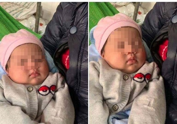 Bé gái bụ bẫm hơn 1 tháng tuổi bị bỏ rơi trước cổng chùa ở Quảng Ninh - 1