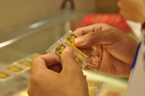 Vàng tăng giá phiên cuối cùng của năm - 1