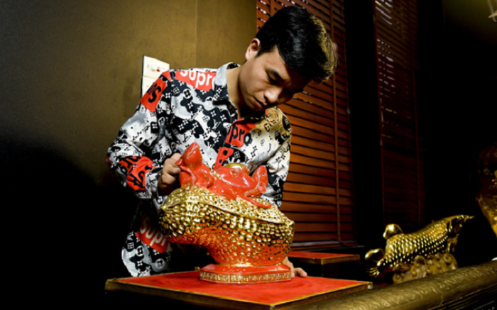 Ảnh: Làng gốm Bát Tràng bận rộn cả đêm đúc tượng chuột bán Tết - 10