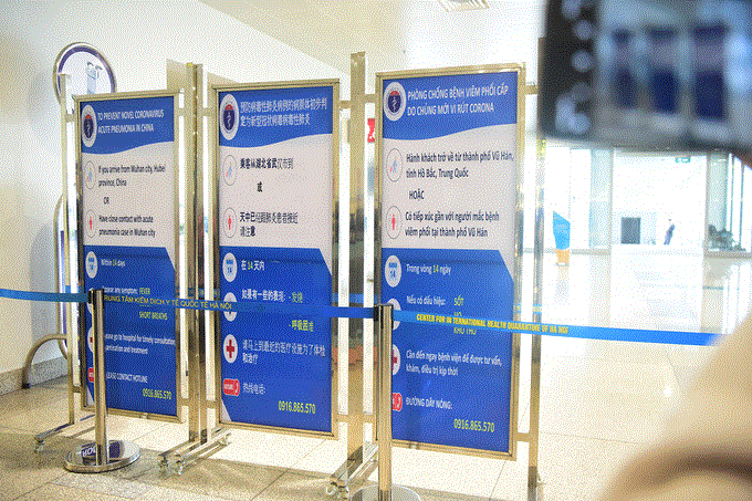 Kiểm tra thân nhiệt khách nhập cảnh sân bay, ngăn chặn dịch viêm phổi lạ từ Trung Quốc - 6