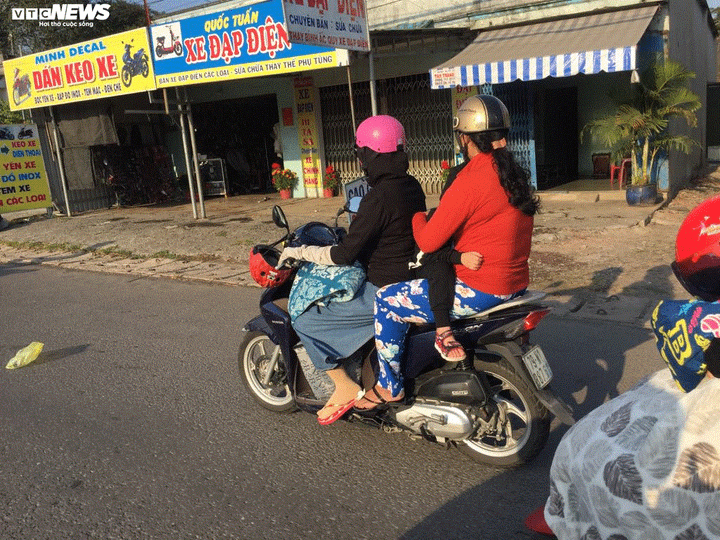 Ảnh: Biển người đội nắng nóng đổ về TP.HCM, xe ô tô nối đuôi nhau xếp dài cây số - 9