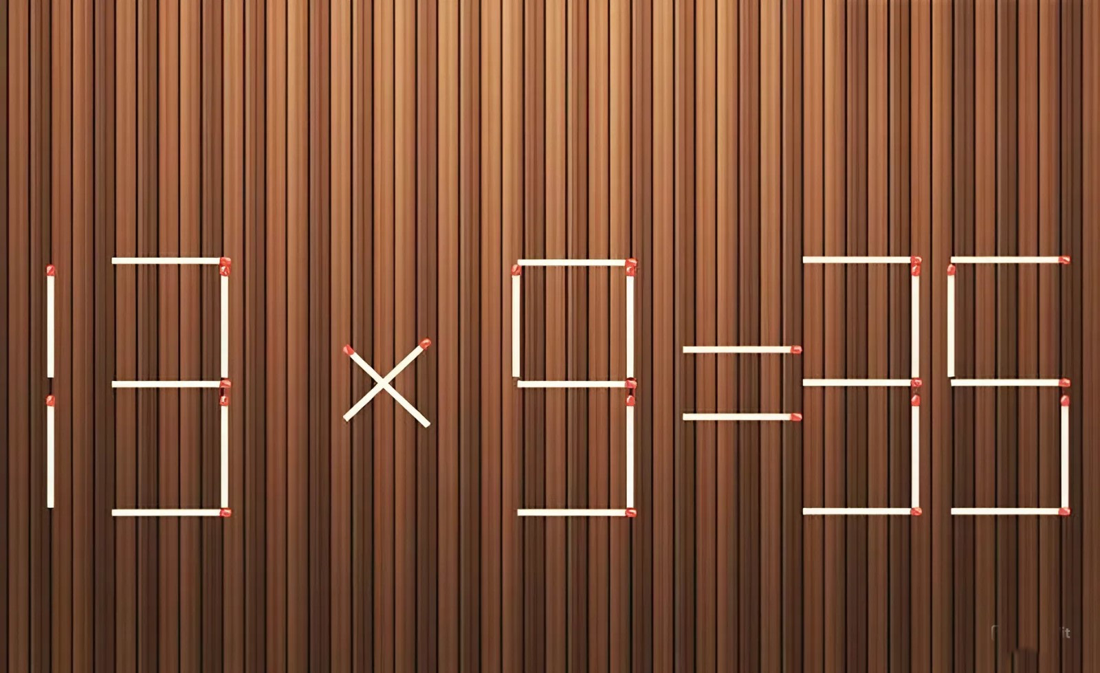 Chỉ được di chuyển 1 que diêm để phép tính 13 x 9 = 35 từ sai thành đúng