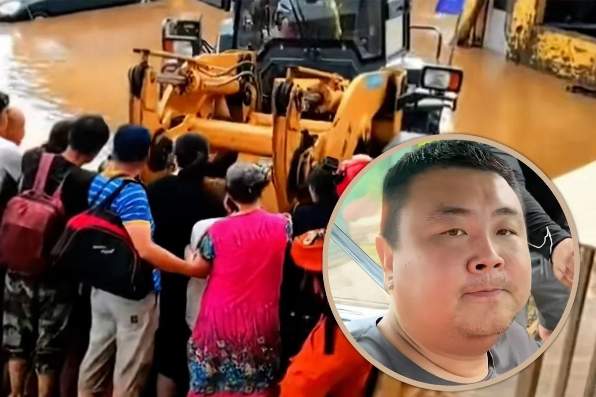 'Người hùng' dùng gầu xúc đất của máy ủi cứu hơn 100 nạn nhân lũ lụt