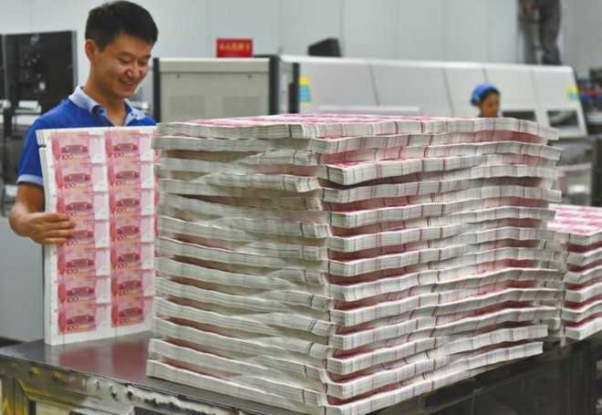 Hoat dong trong nha may in tien Trung Quoc hinh anh 1
