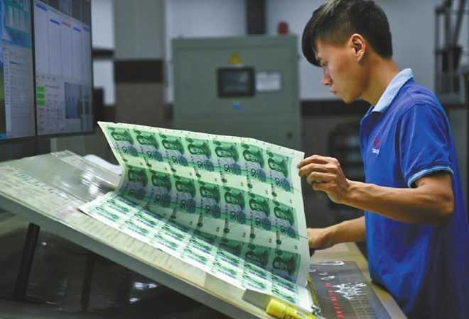 Hoat dong trong nha may in tien Trung Quoc hinh anh 5