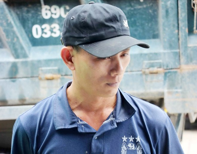 Bat duoc tai xe bo tron sau khi tong chet nguoi quet rac hinh anh 1