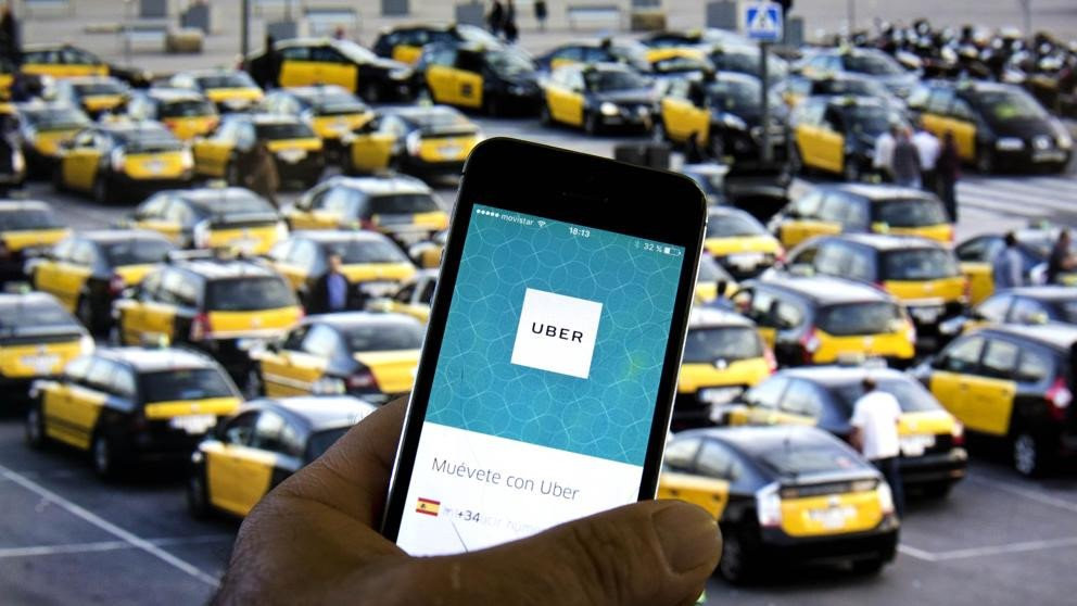 Vi sao nhieu nuoc phat trien xem mo hinh cua Grab, Uber la taxi? hinh anh 1