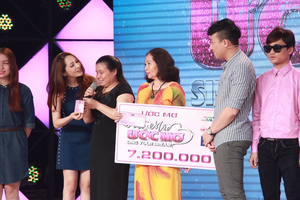 TRAN THANH - BAO ANH TANG TIEN VA VE MAY BAY 7