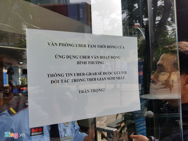 Lo chuyen Uber sap nhap Grab, tai xe tim den van phong hinh anh 1