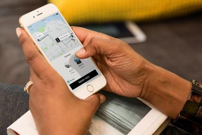 Singapore yeu cau Grab va Uber tri hoan viec sap nhap toi ngay 15/4 hinh anh 1