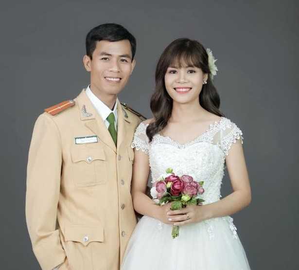 Thieu uy CSGT nhay xuong song cuu nguoi hinh anh 2