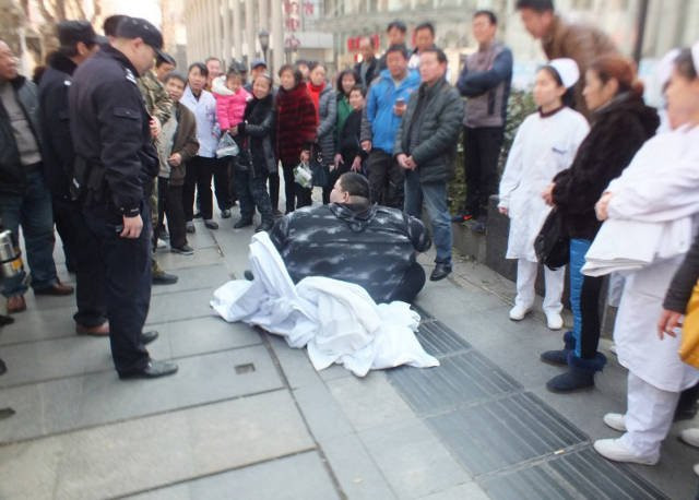 nguoi-dan-ong-beo-nhat-tq-giam-70k-5-thang-2