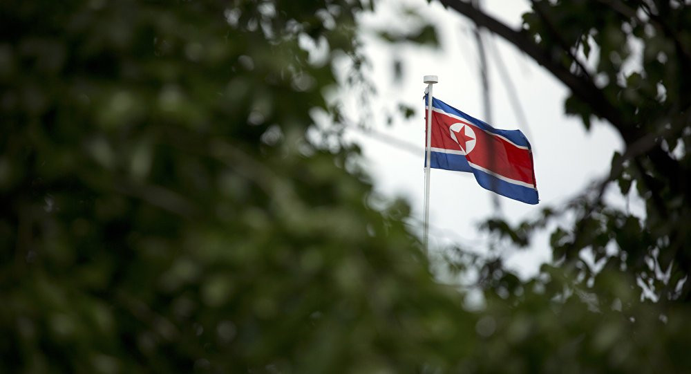 North Korea flag Beijing embassy AP
