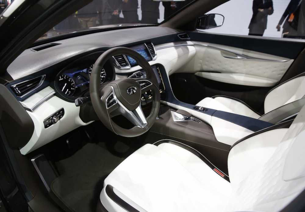 inside-the-concept-is-composed-of-a-mix-of-high-gloss-wood-and-plastic-the-center-console-comes-with-a-display-for-navigation-and-infotainment-but-also-shows-how-the-new-engine-is-performing