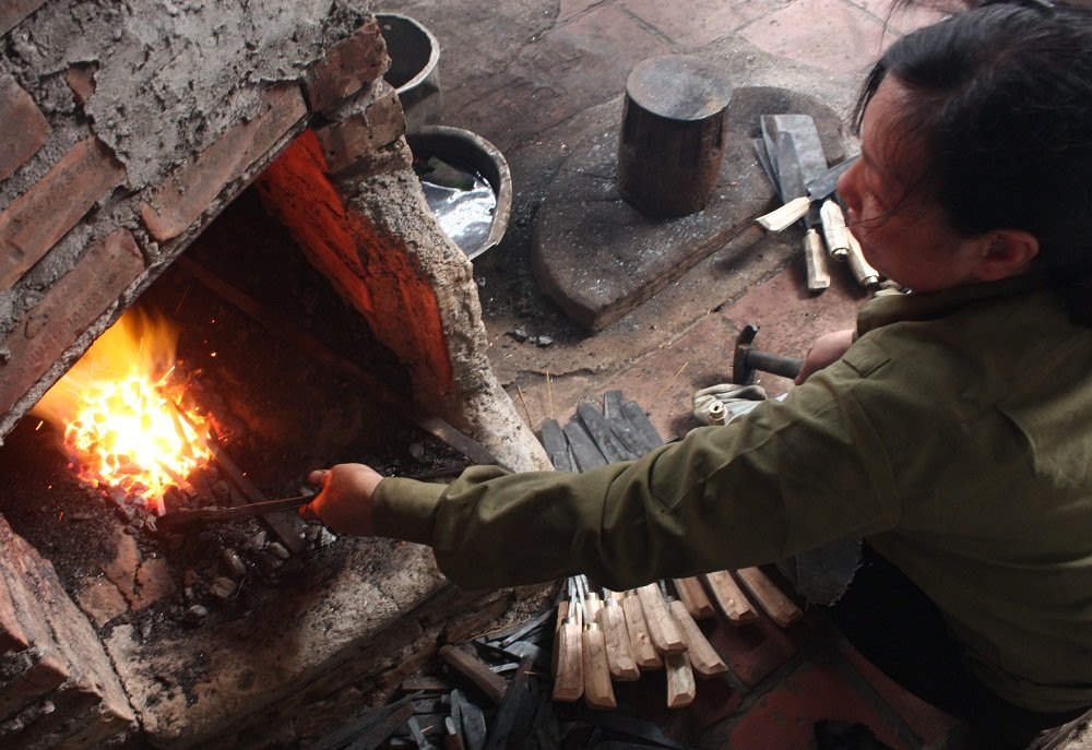 Hinh anh Nguoi phu nu hon 30 nam giu lua lo ren o Ha Noi 16