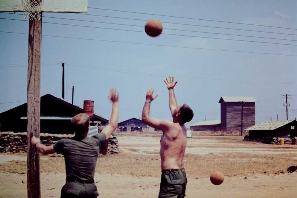 these-photos-offer-two-perspectives-of-the-war-the-actual-conflicts-of-the-war-and-the-raw-moments-between-soldiers-as-they-hung-out-in-their-downtime