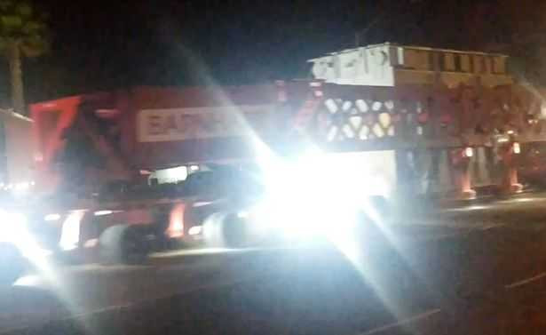 MAIN-Police-transport-massive-object-in-huge-convoy-at-dead-of-night