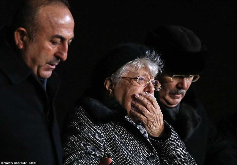 3B8BE8E200000578-4051744-Karlov_s_mother_Maria_accompanied_by_Turkish_foreign_minister_Ca-a-32_1482265329845