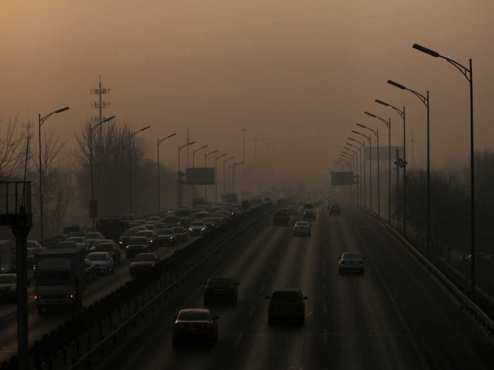 but-after-apec-when-the-worlds-attention-has-turned-away-traffic-resumed-and-the-smog-came-back