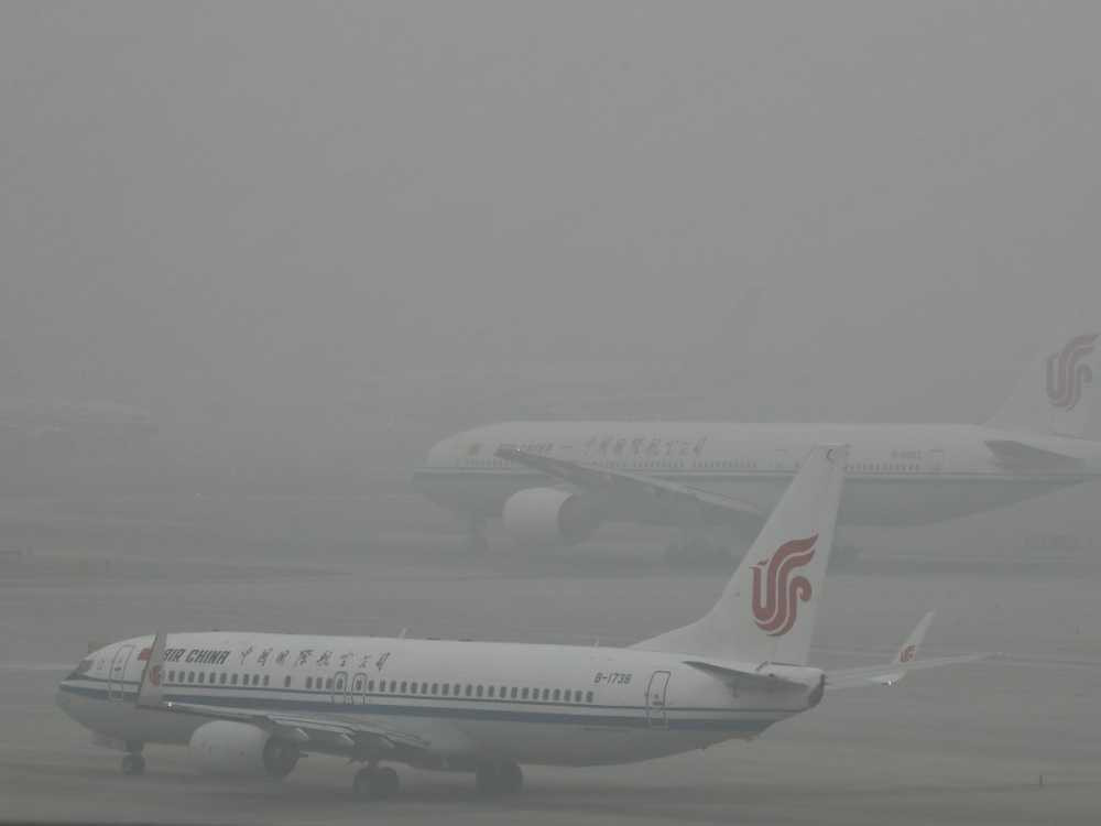 but-air-china-passenger-planes-were-shrouded-by-heavy-smog-this-week-beijing-capital-international-airport-cancelled-hundreds-of-flights-due-to-low-visibility