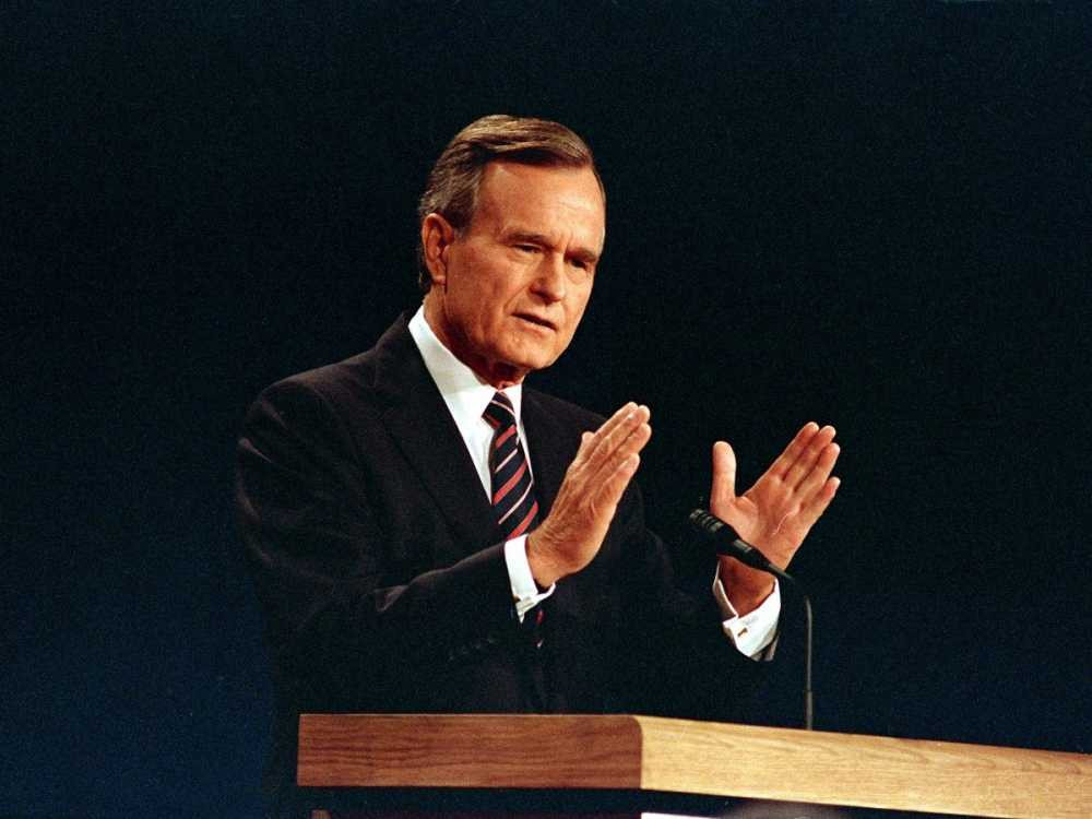 appearing-without-his-trademark-glasses-then-vice-president-george-h-w-bush-answers-a-question-at-the-second-presidential-debate-in-october-1988