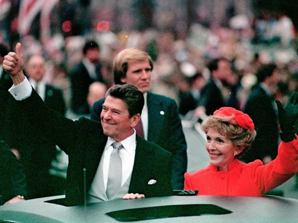 former-president-ronald-reagan-and-first-lady-nancy-reagan-greet-fans-lined-up-in-washington-at-his-first-inauguration-in-january-1981
