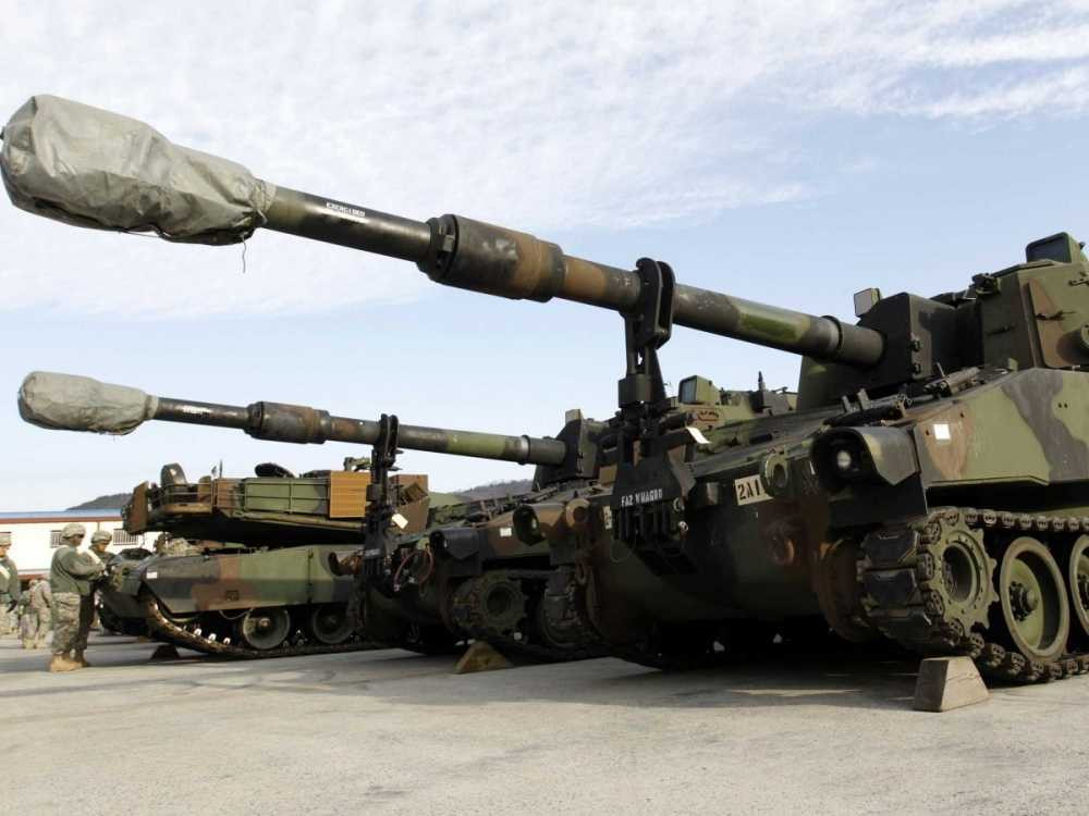 the-united-states-m109a6-paladin-is-one-of-natos-nearest-equivalent-weapons-with-a-155mm-cannon-similar-to-the-koalitsiya-sv-it-requires-a-six-man-crew-to-operate-the-machine
