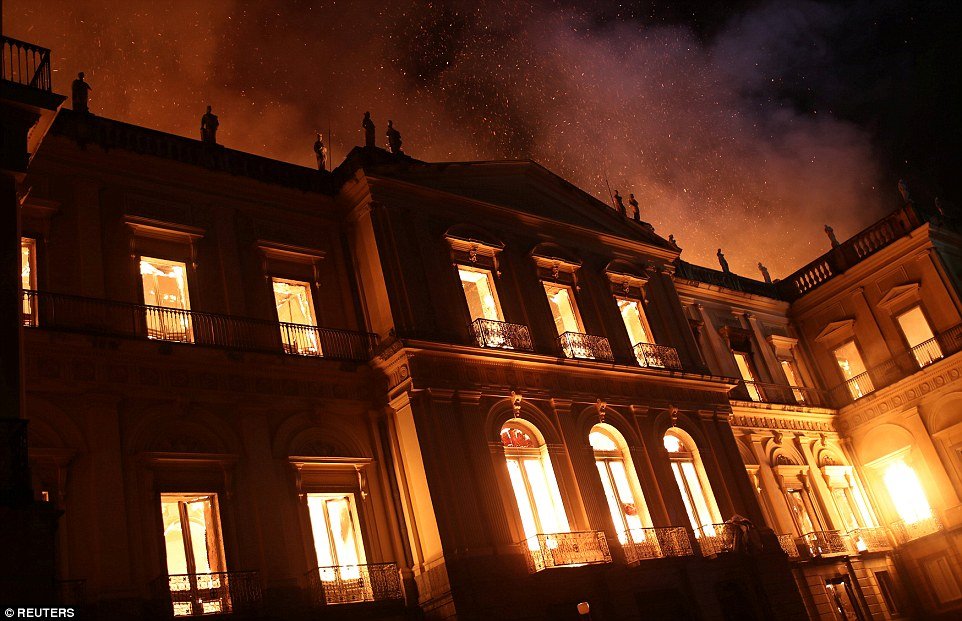 4FA739DC00000578-6125217-Firefighters_try_to_extinguish_a_fire_at_the_National_Museum_of_-a-56_1535936566415 3