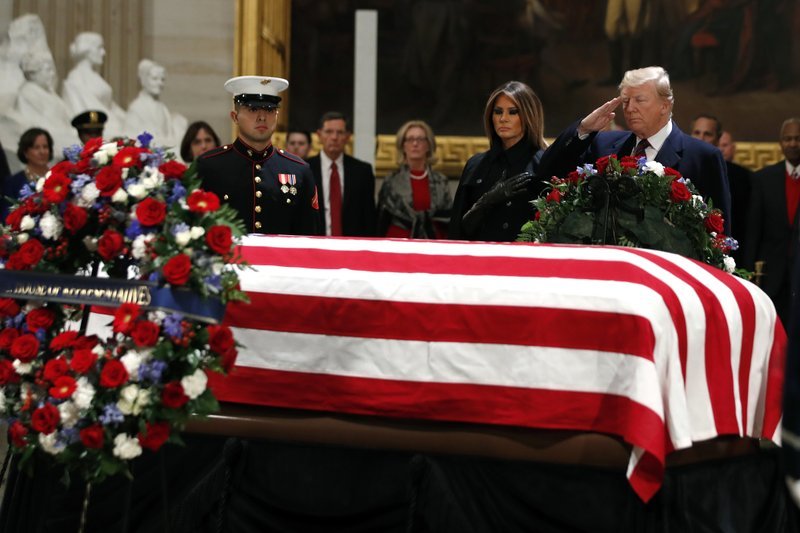 trump-melania-bush-funeral-1-09343410