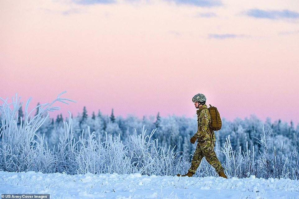 8044610-6547191-A_paratrooper_walks_to_the_rally_point_after_completing_an_airbo-a-57_1546438254591 9