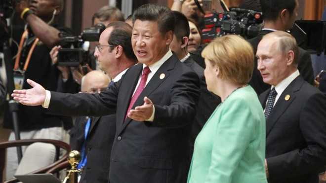 Trung Quoc de nghi G20 'hanh dong chu dung chi noi' hinh anh 1