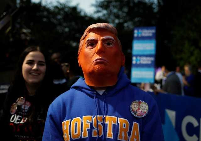 100 trieu luot nguoi xem Trump dau khau voi Clinton hinh anh 12