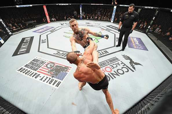 Ha knock-out doi thu, ‘ga dien’ McGregor di vao lich su UFC hinh anh 1