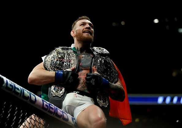 Ha knock-out doi thu, ‘ga dien’ McGregor di vao lich su UFC hinh anh 6