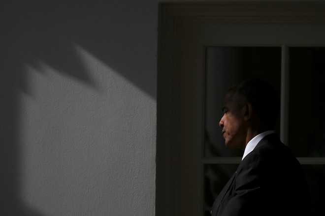 Obama nguoc xuoi an ui nhan vien Nha Trang sau cu soc Trump hinh anh 2