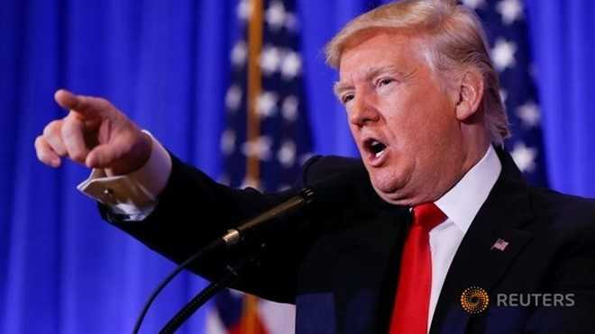 Nguoi bieu tinh len ke hoach pha roi le nham chuc cua Trump hinh anh 1