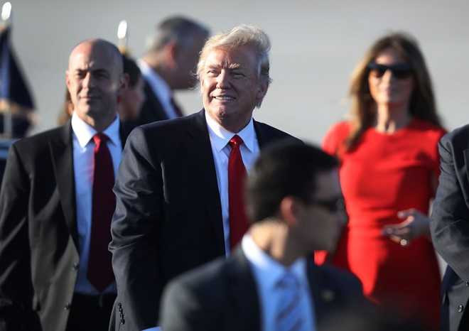Ky nghi dau tien trong hon loan cua Tong thong Trump hinh anh 2