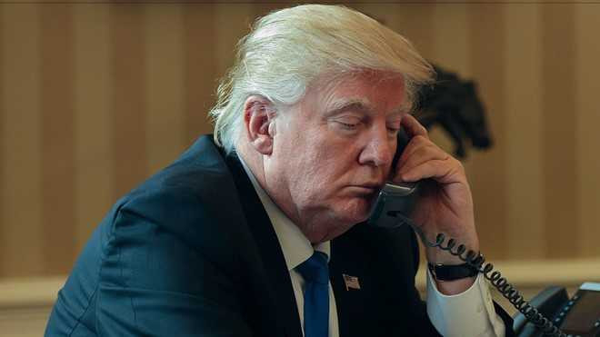 Dien dam voi Putin, Trump len an hiep uoc hat nhan cua Obama hinh anh 1