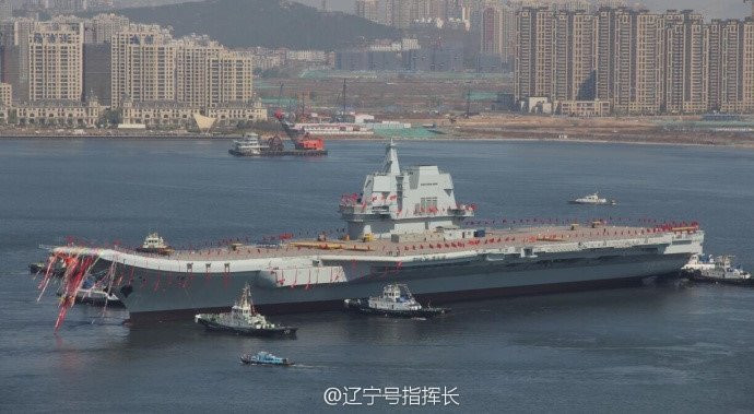 Tau san bay tu che dau tien cua Trung Quoc trong le ha thuy hinh anh 1