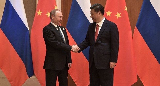 Ong Putin va ong Tap nhat tri tang cuong quan he Nga - Trung hinh anh 1