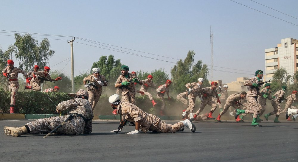 180924-iran-military-parade-attack-al-1001_4449e1f5a8364197849c00c2fba92185