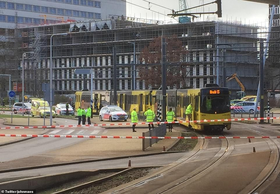 11132424-6821647-Incident_Emergency_services_have_cordoned_off_a_tram_in_Utrecht_-a-20_1552907299842