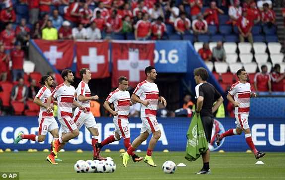 1466005714138_lc_galleryImage_Switzerland_players_warm_