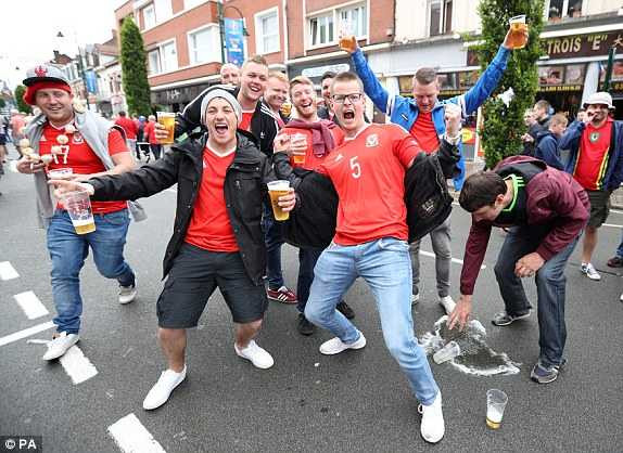 1466077002149_lc_galleryImage_Wales_fans_soak_up_the_at