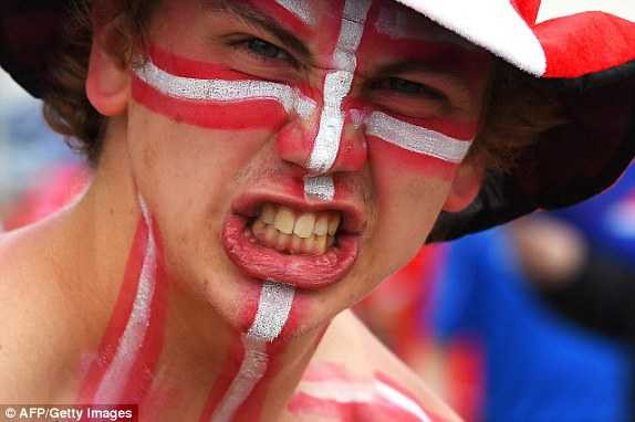 1466607747990_lc_galleryImage_An_Iceland_supporter_grim