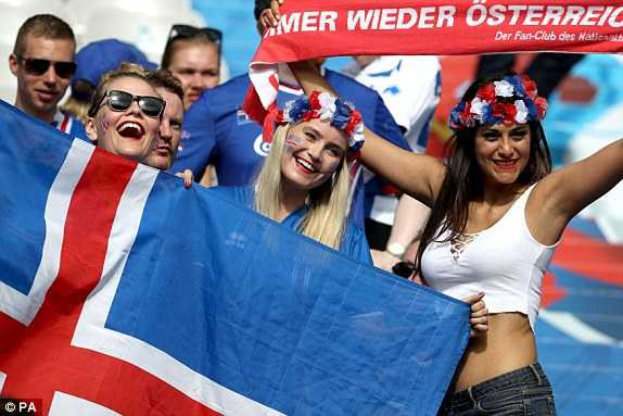 1466610649215_lc_galleryImage_Iceland_fans_cheer_on_the
