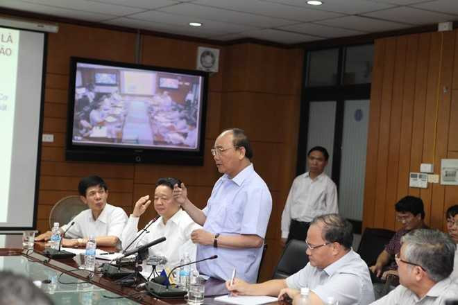 Thu tuong: 'Dung cac cuoc hop de tap trung chong bao' hinh anh 1