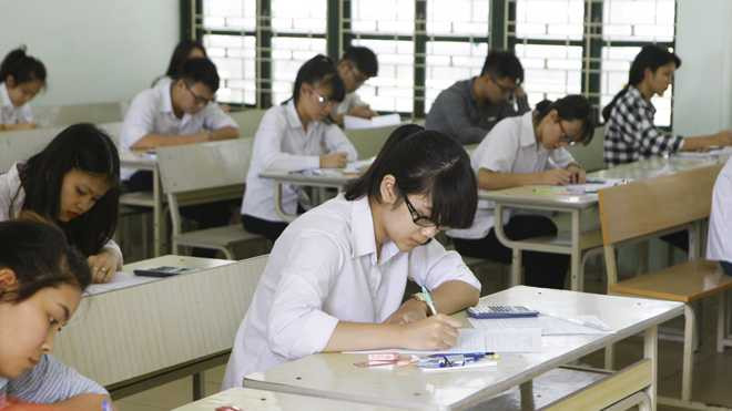 Thí sinh làm bài thi tốt nghiệp THPT Quốc Gia 2016. Ảnh: Như Ý