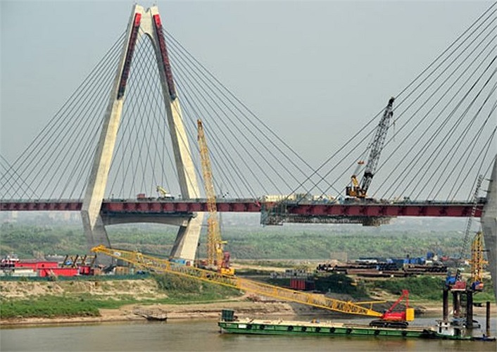 Tổng chiều dài Dự án là 8.933m, trong đó cầu Nhật Tân dài 3.755,0m, mặt cắt ngang 33,2m theo quy mô cầu thiết kế vĩnh cửu. 