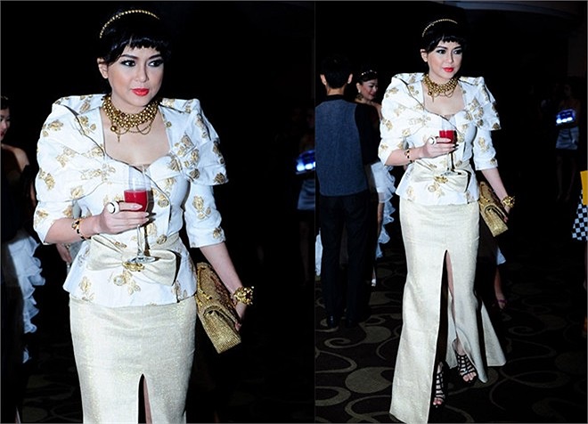 Bộ cánh rườm rà mang đậm phong cách Hoàng gia của mẹ chồng Hà Tăng diện khi tham dự show xuân - hè 2013 của Đỗ Mạnh Cường là tiêu điểm chú ý của showbiz trong tháng 5/2013.